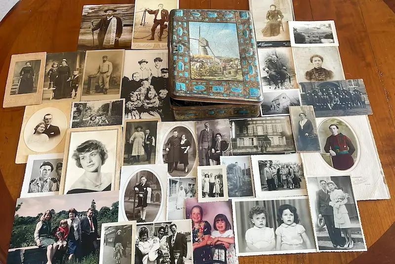 An old metal box with vintage family photographs